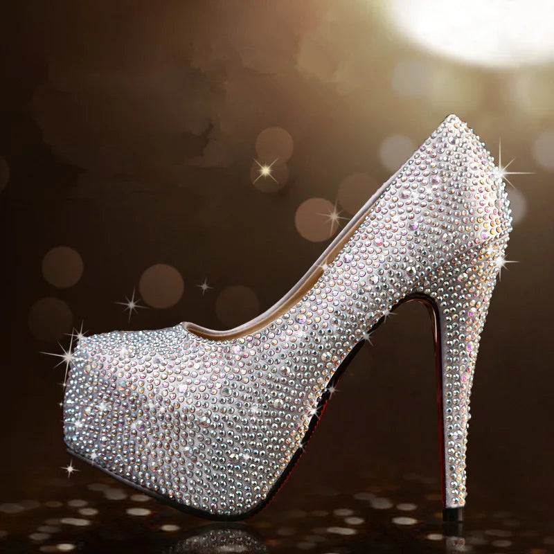 a high heeled shoe with lots of diamonds on it