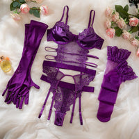 Purple lace lingerie set with matching G-string, stockings, and gloves for a seductive look in luxurious NZ design.