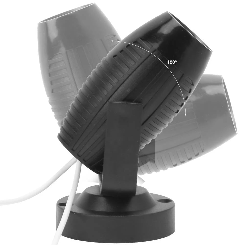 a black and white photo of a desk lamp