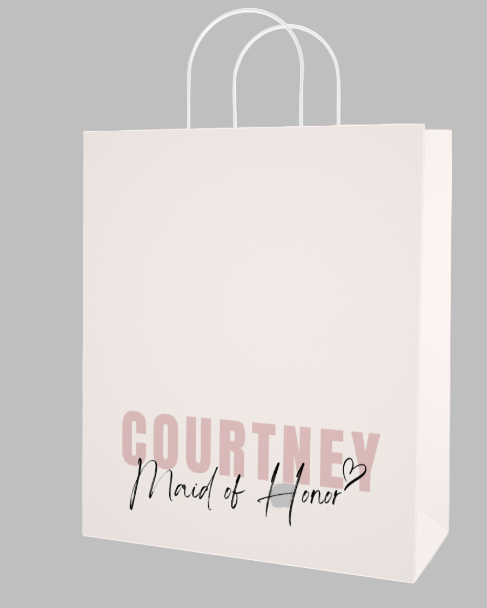 Gift bag with 'Courtney Maid of Honor' text on a light background