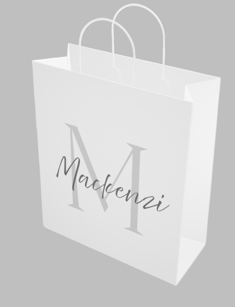 White tote bag with 'Mackenzi' printed on it against a white background