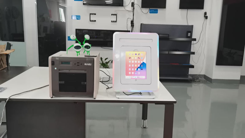 a table with two electronic devices on top of it